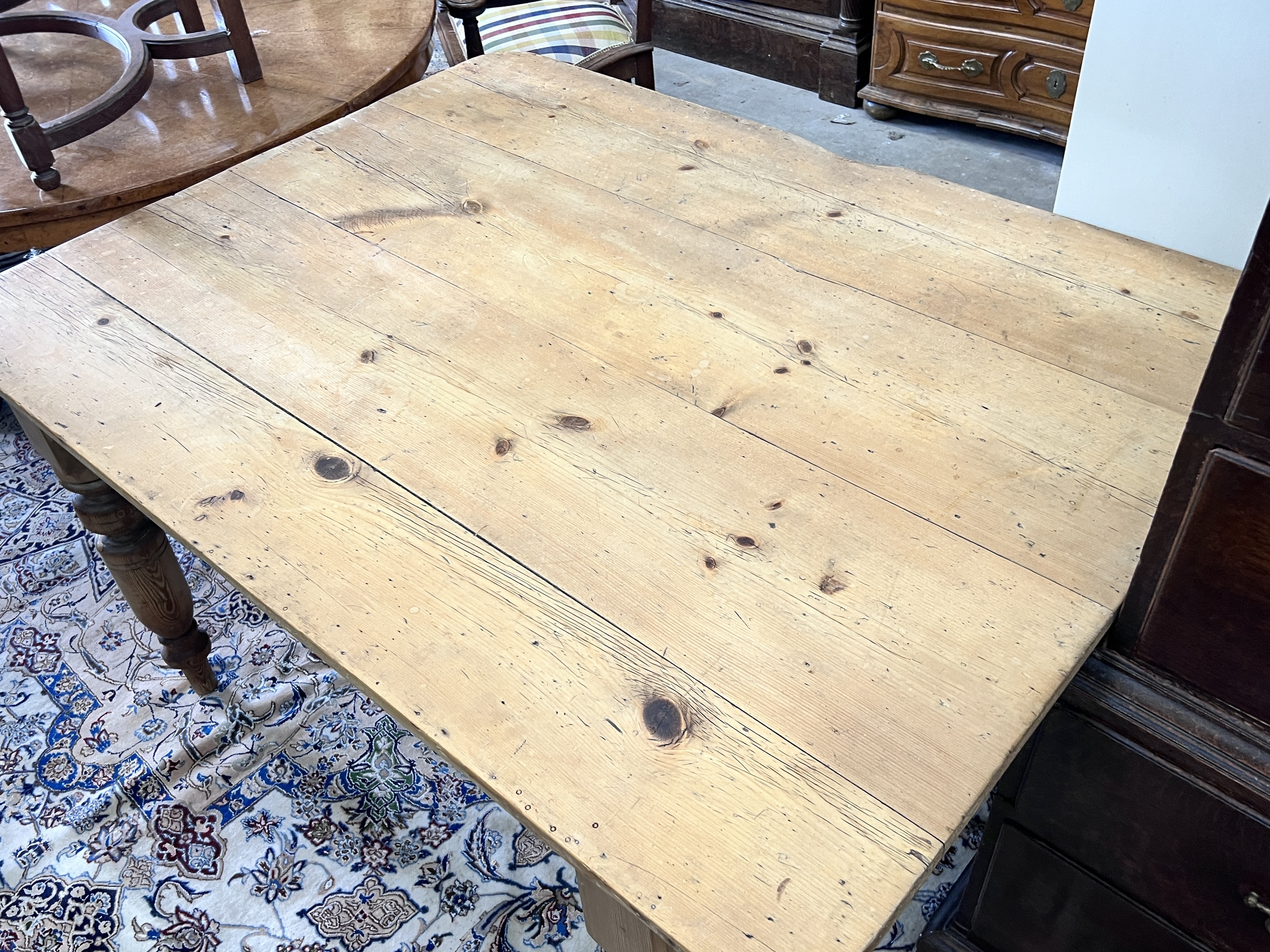 A Victorian stripped pine kitchen table, length 130cm, width 99cm, height 76cm